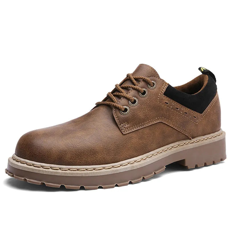 Men's black casual lace-up shoes with a round toe and low-cut design on a rubber sole.