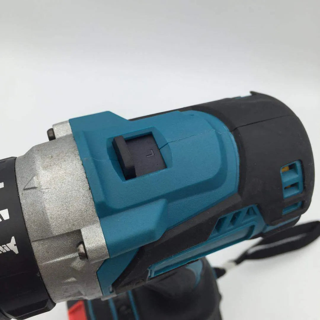 Cordless 21V impact drill and screwdriver with lithium battery and keyless chuck on grey background