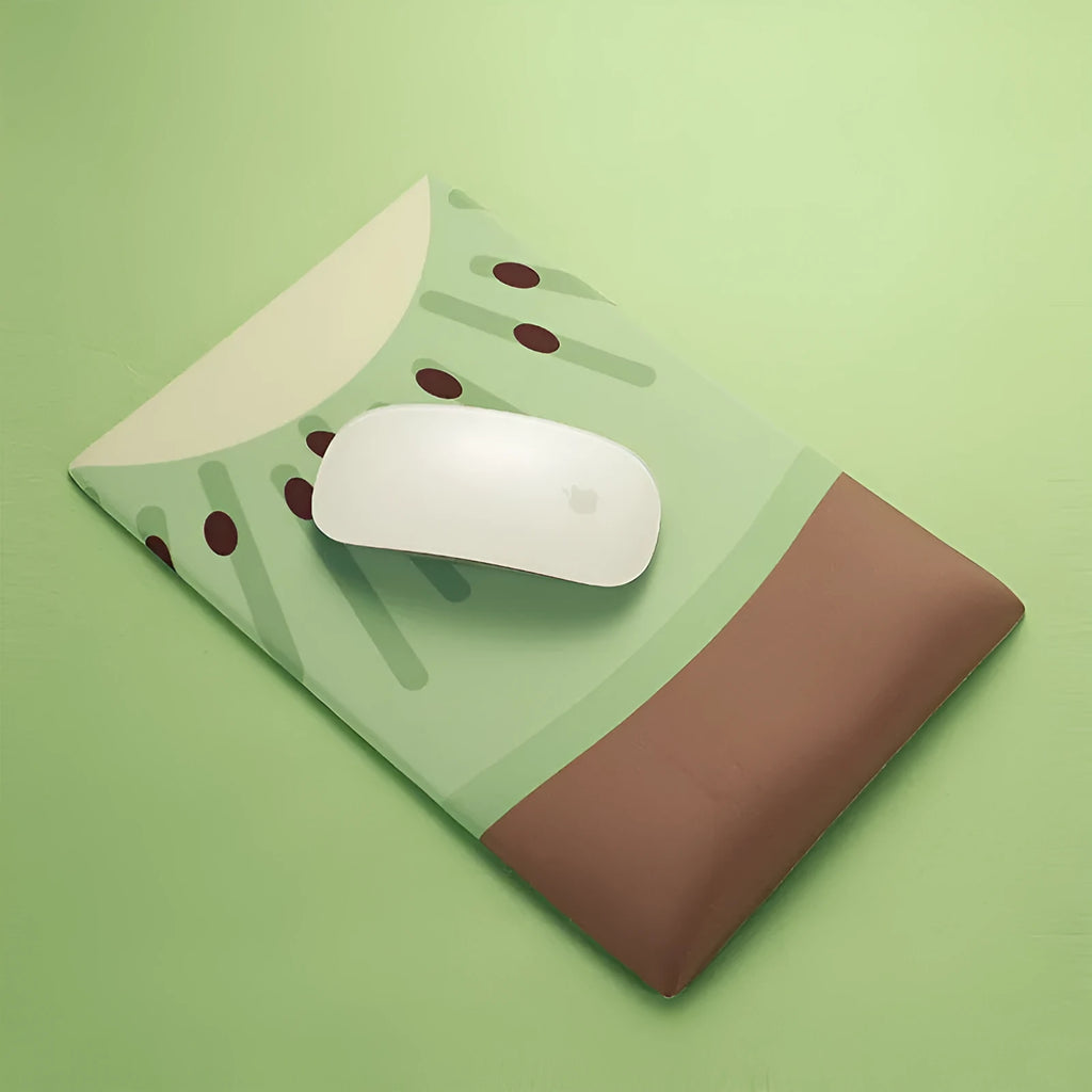A soft gel-filled wrist mouse pad with a cute printed design on a cloth surface.