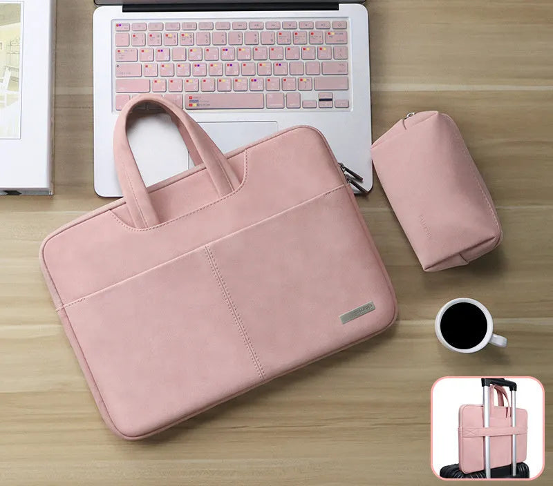 Blue PU leather laptop bag open to show internal padded computer compartment and organisation pockets.