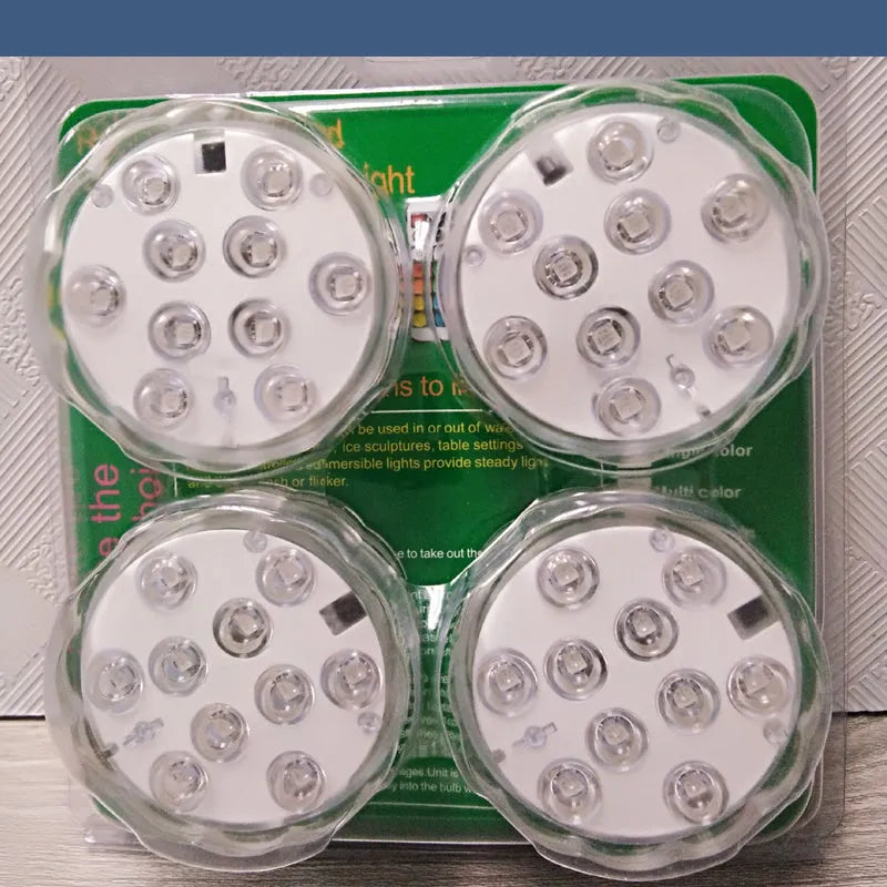 White IP68 waterproof remote control diving light with LED beads for pools and gardens.