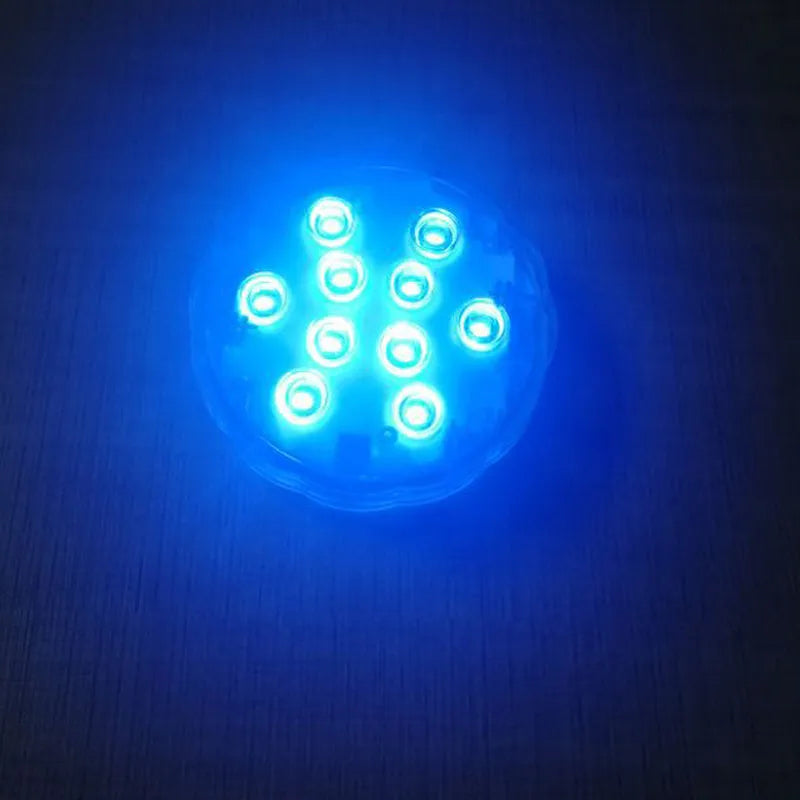 White IP68 waterproof remote control diving light with LED beads for pools and gardens.