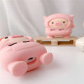 Pink silicone AirPods case with cartoon pig design, flip cover, and carrying hook compatible with Apple AirPods 1, 2, and Pro