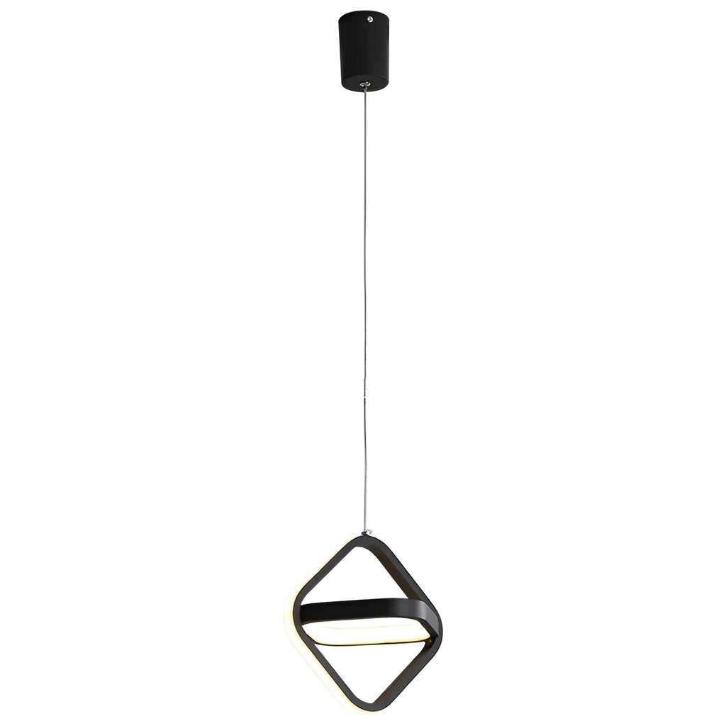 Modern black iron bedside lamp with a square shade and remote control on a wooden table.