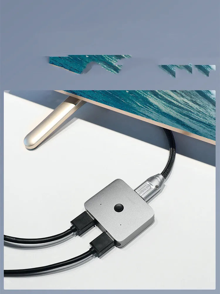 Grey Haibeisi HDMI switcher splitter device with multiple HDMI ports for 4K video sharing.