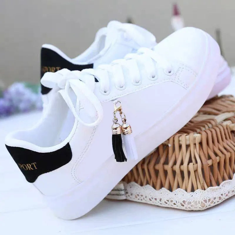 Women's white mesh casual fashion shoe with rubber sole, shown in pink and black colour options.