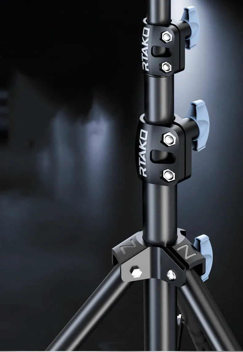 Carbon alloy mobile phone live tripod with true carbon steel bracket, selfie remote, and 10 inch lamp on white background