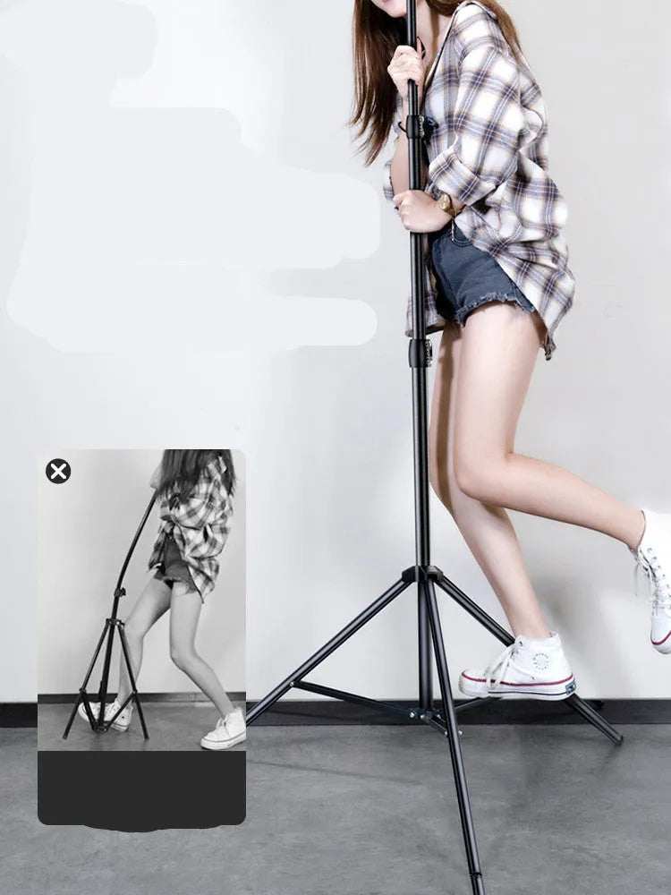 Carbon alloy mobile phone live tripod with true carbon steel bracket, selfie remote, and 10 inch lamp on white background