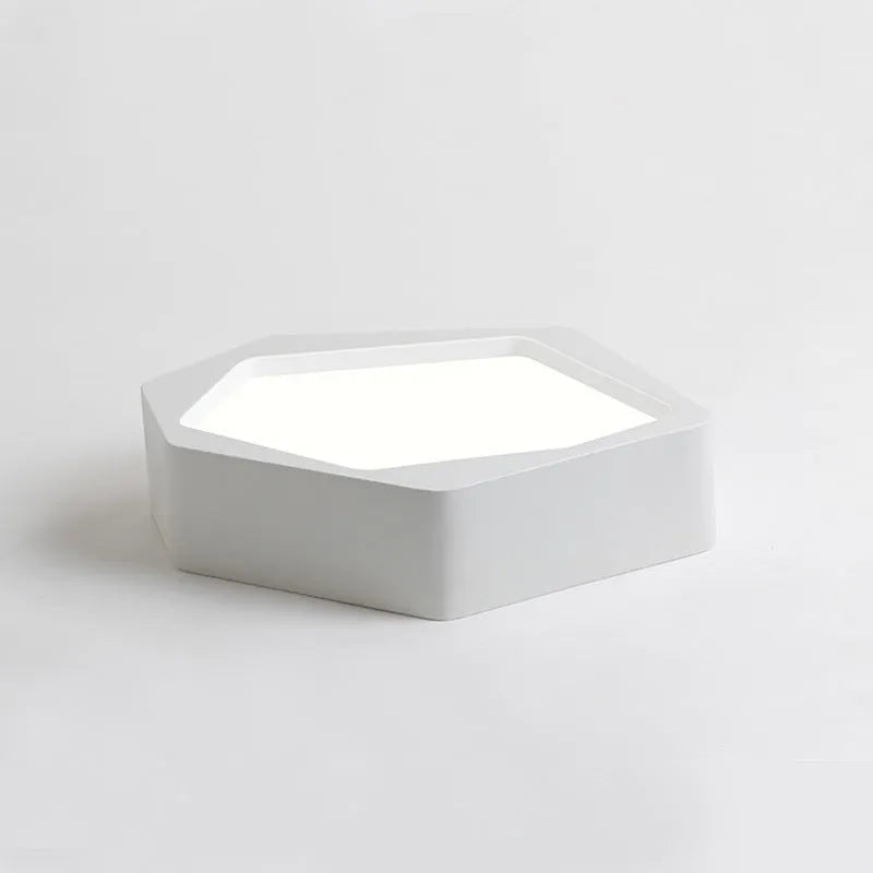 Geometric shaped LED wall light in black frame with three colour modes for living room or bedroom