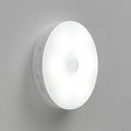 Wireless motion sensor LED light unit for automatic activation in dark home areas.