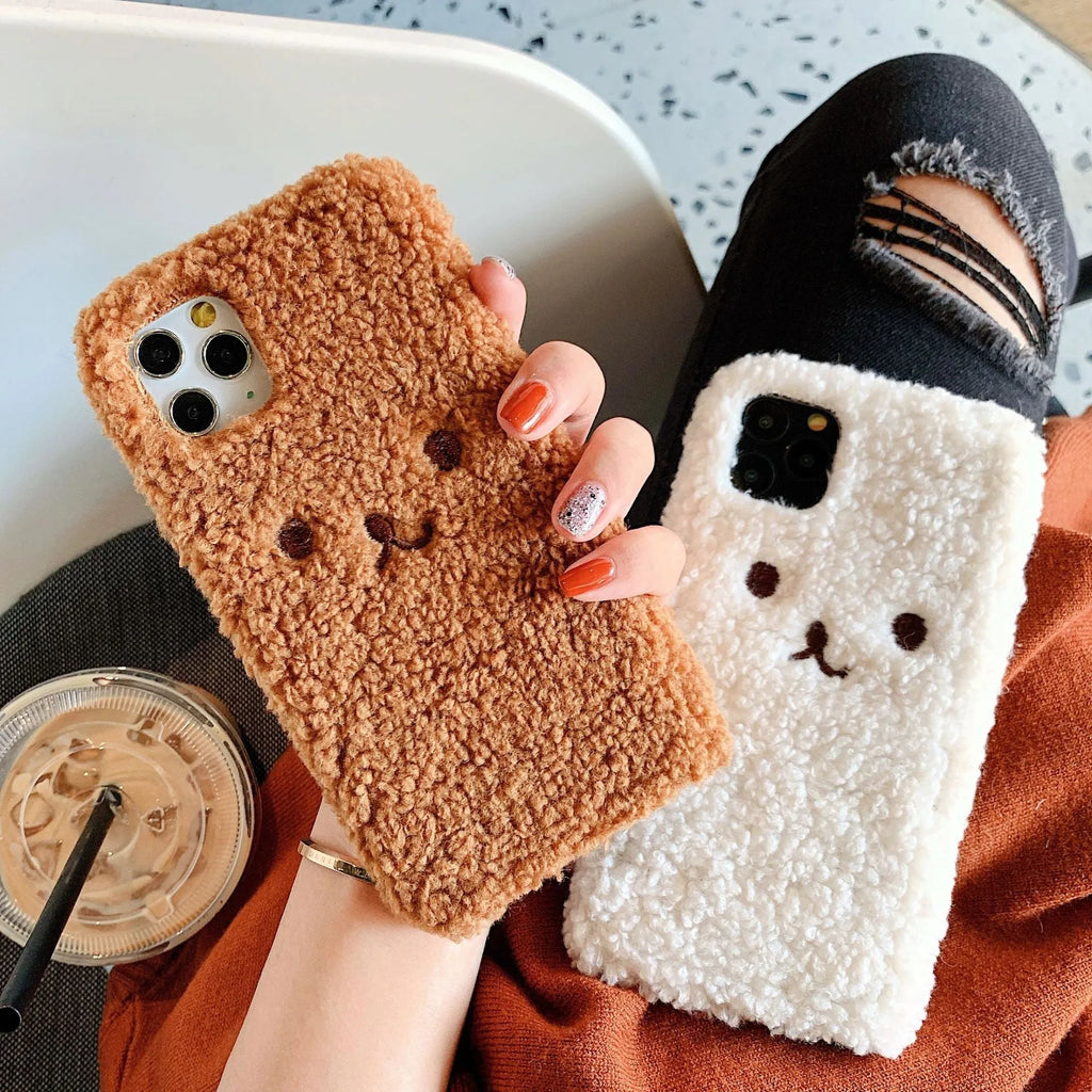 Embroidered brown plush bear cartoon design on a white TPU iPhone case for iPhone 11.