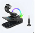 Silver and black universal action camera backpack clip with 360-degree rotation mount.
