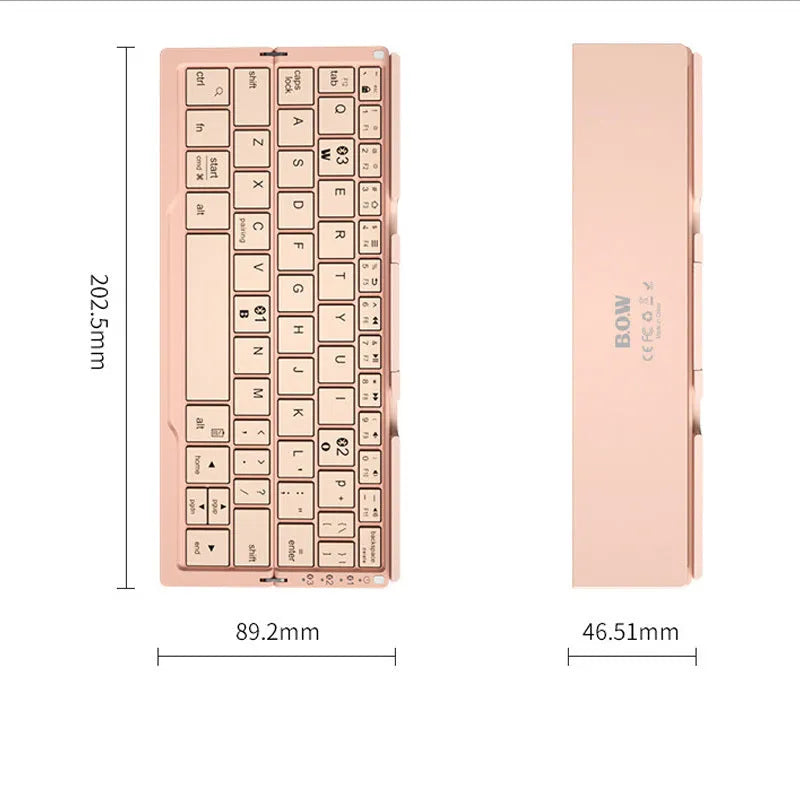 Silver folding Bluetooth keyboard propping up smartphone with hidden stand extended