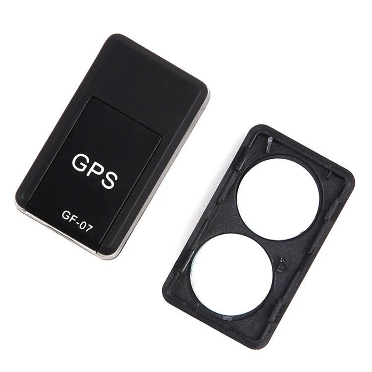 Small black magnetic GPS car tracker device for real-time vehicle and asset tracking.
