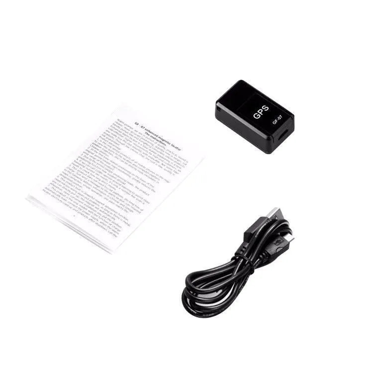 Small black magnetic GPS car tracker device for real-time vehicle and asset tracking.