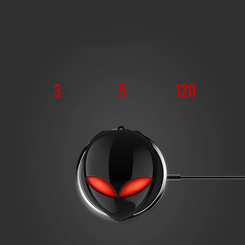 Creative Outer T8 Starman alien design Bluetooth headset with red LED lights and wireless charging case.