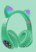 Cute cat ear Bluetooth headset in pink with over-ear design and built-in microphone