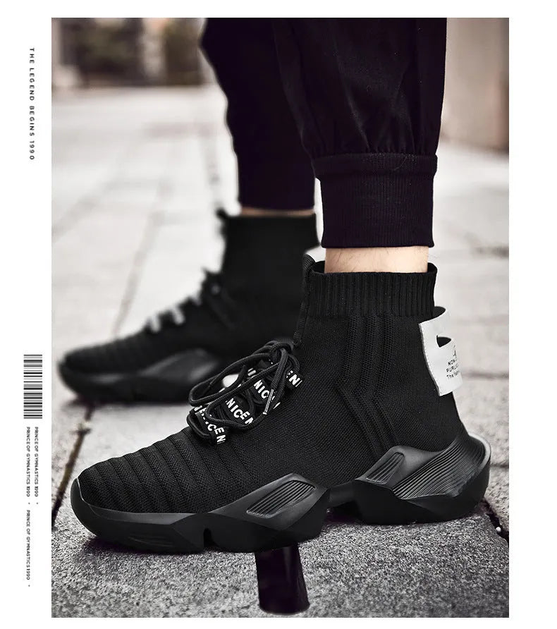 Men's black and white casual sports shoes with mesh lining, shown in large sizes.