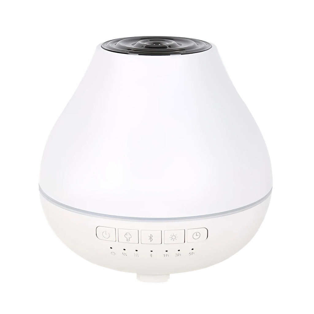 White circular Bluetooth humidifier and aroma diffuser with night light on a wooden surface.