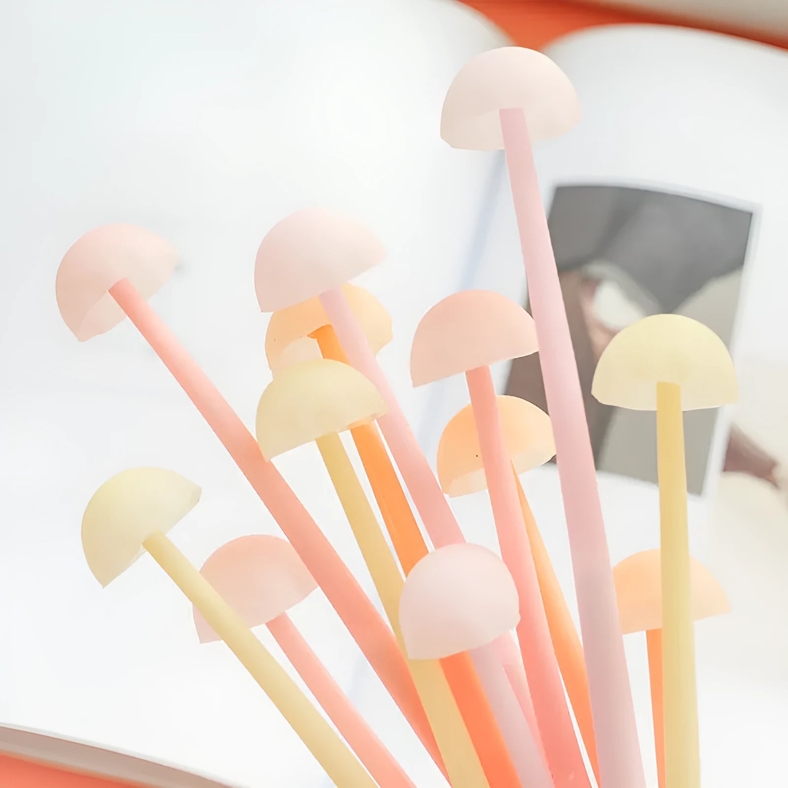 Black luminous mushroom silicone gel pen with cartoon design on white background