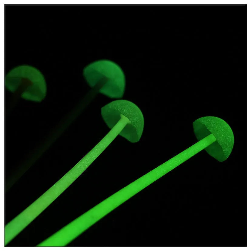 Black luminous mushroom silicone gel pen with cartoon design on white background