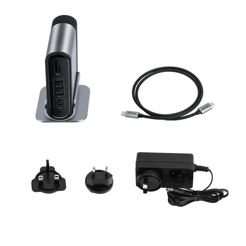Deep space grey 16-in-1 USB-C docking station hub with multiple ports and external power supply on a desk.