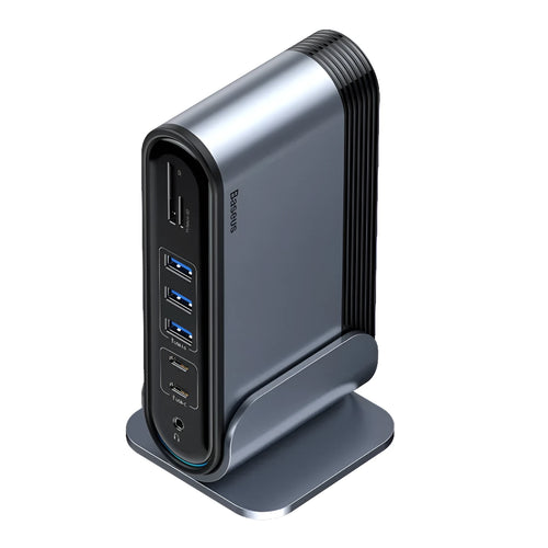Deep space grey 16-in-1 USB-C docking station hub with multiple ports and external power supply on a desk.