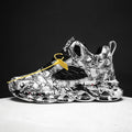 Men's black and green camouflage high-top basketball shoes on a white background.