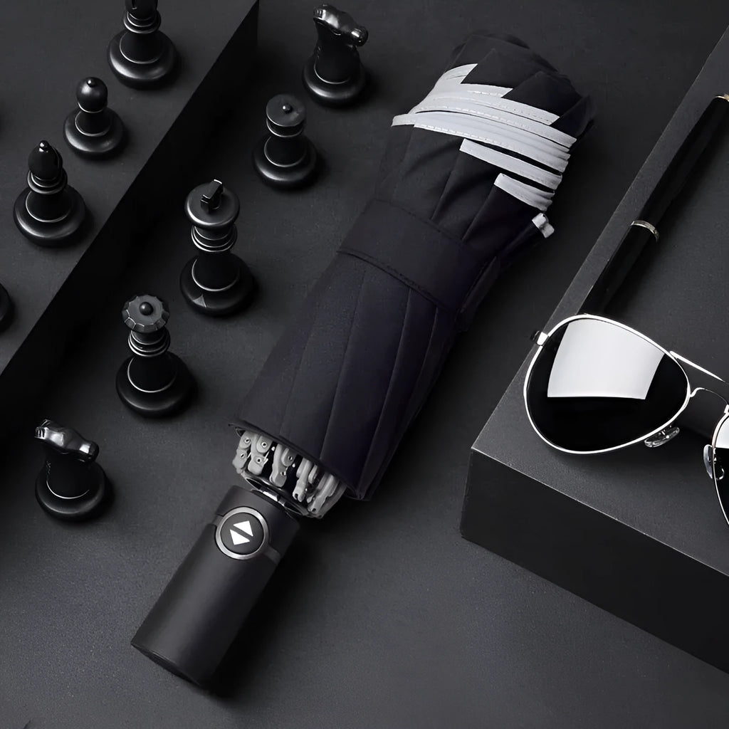 Black automatic reverse umbrella shown open with reflective cloth and 10-rib construction