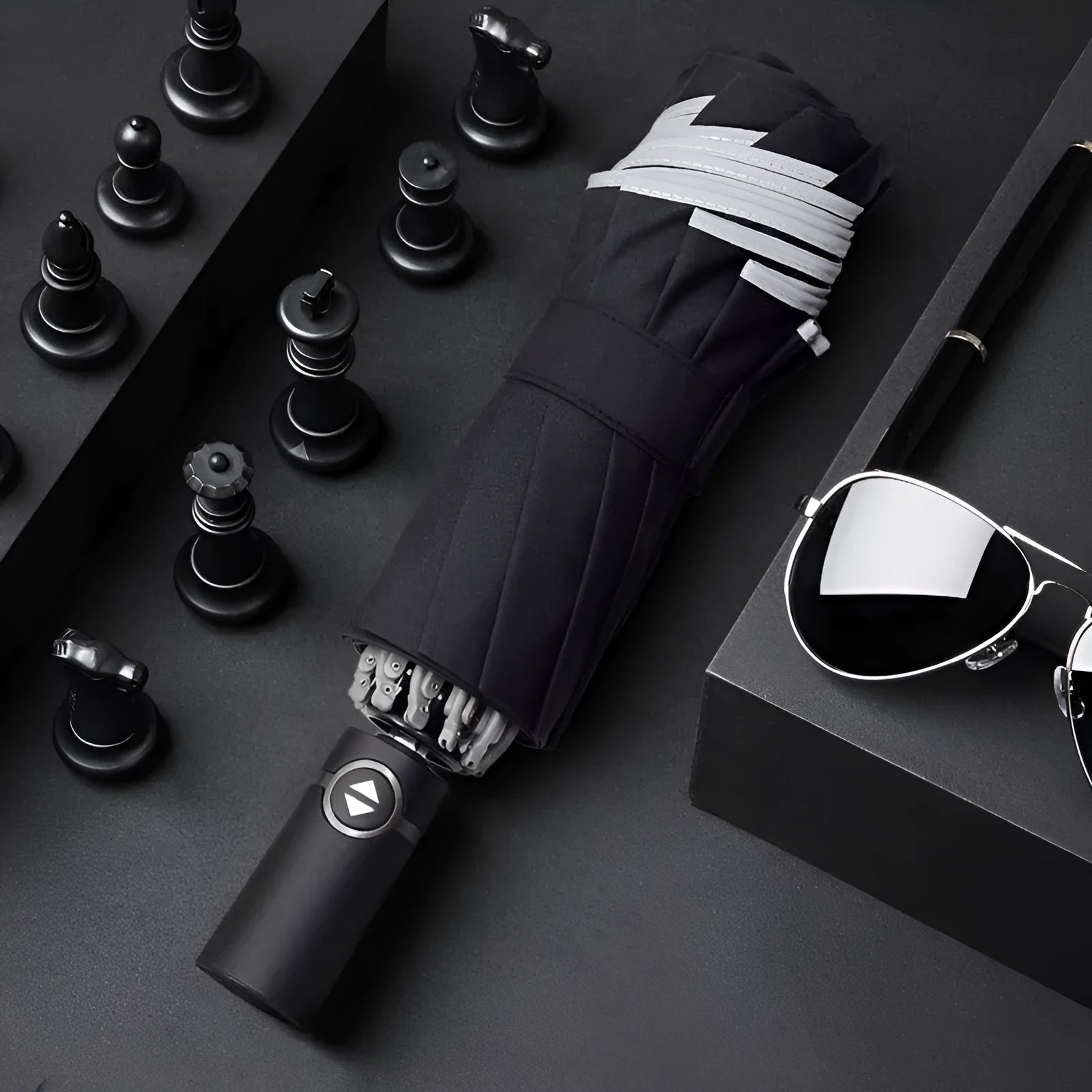 Black automatic reverse umbrella shown open with reflective cloth and 10-rib construction