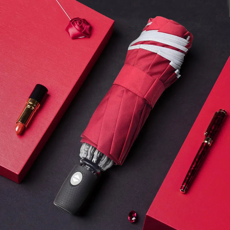 Black automatic reverse umbrella shown open with reflective cloth and 10-rib construction