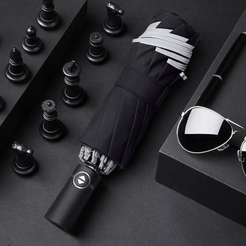 Black automatic reverse umbrella shown open with reflective cloth and 10-rib construction