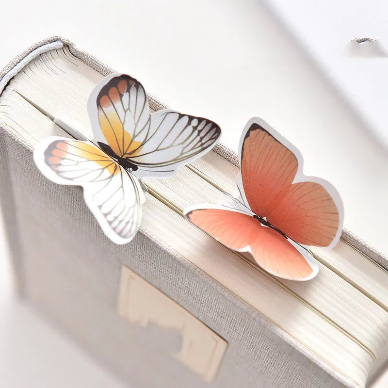 Butterfly-shaped paper bookmark from Fun Dream, showing random colour design.