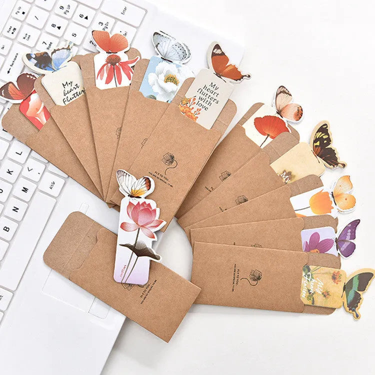 Butterfly-shaped paper bookmark from Fun Dream, showing random colour design.