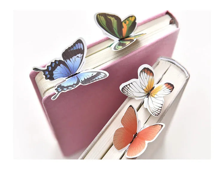 Butterfly-shaped paper bookmark from Fun Dream, showing random colour design.