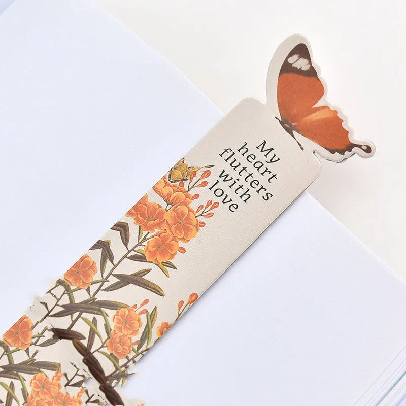 Butterfly-shaped paper bookmark from Fun Dream, showing random colour design.