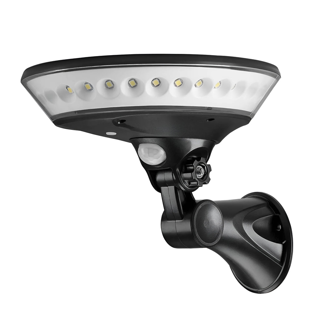 White ABS plastic 360-degree solar security light with solar panel on top, mounted on an outdoor wall.