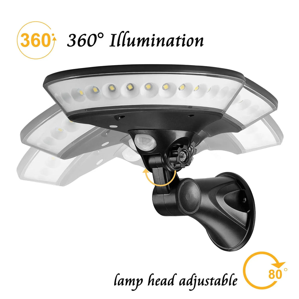 White ABS plastic 360-degree solar security light with solar panel on top, mounted on an outdoor wall.
