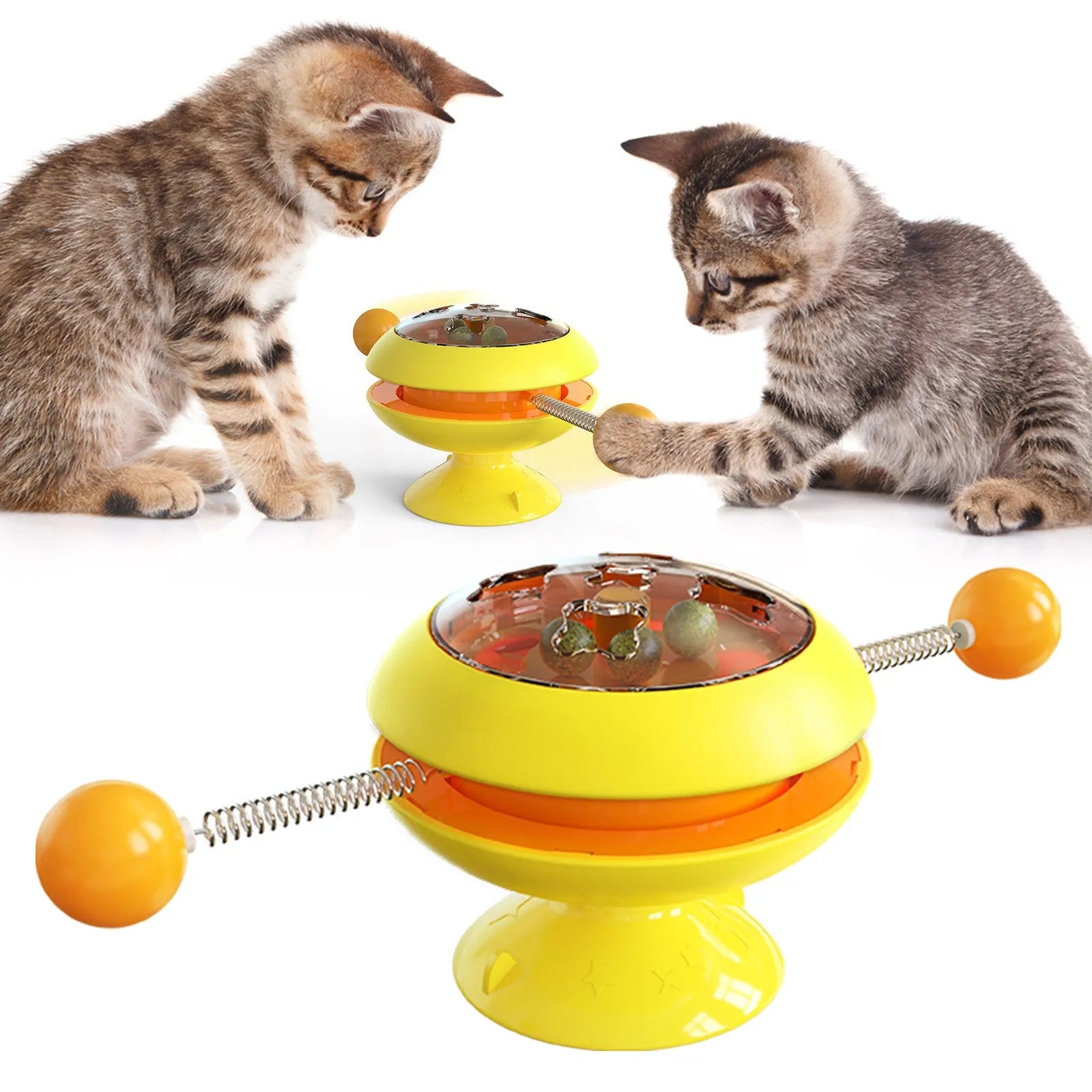Rotating turntable cat toy with transparent catnip compartment and suction cup base