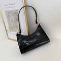 Small square women's underarm bag in PU leather available in multiple colours and animal prints