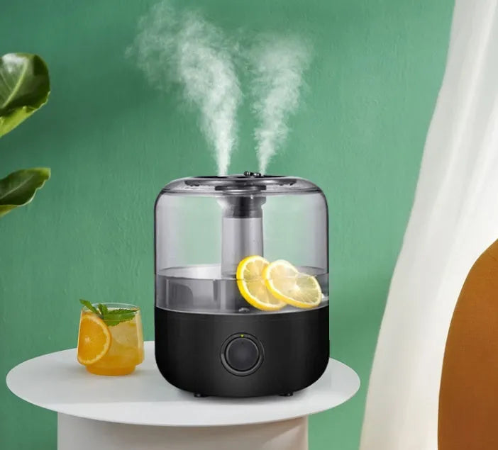 White or black ultrasonic humidifier with 3 litre tank for bedroom use, showing mechanical controls and compact design