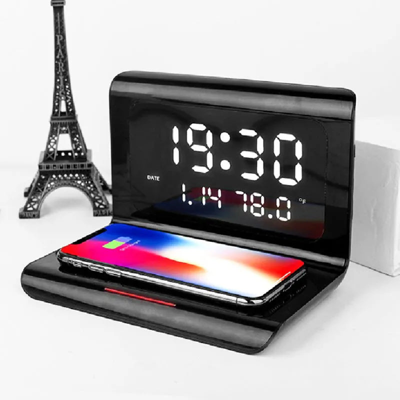 White wireless charging pad with digital clock showing time, date, temperature and humidity display.