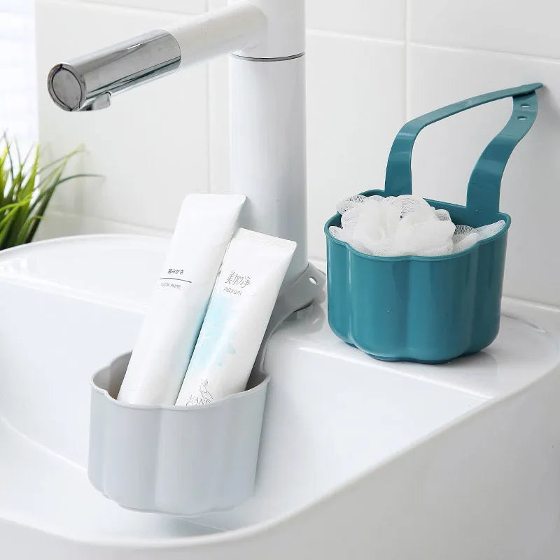 Nordic style plastic sink drain basket in dark blue on a kitchen counter