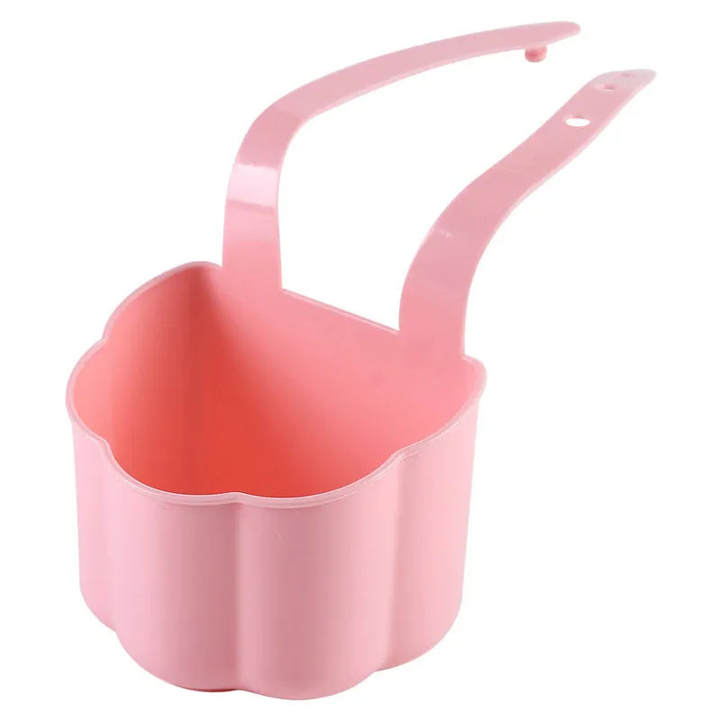 Nordic style plastic sink drain basket in dark blue on a kitchen counter