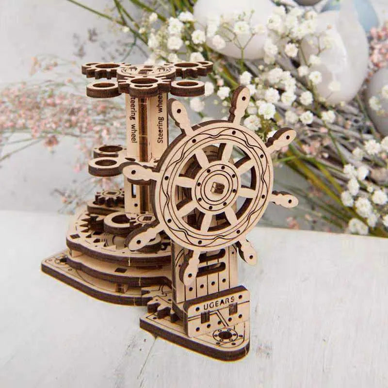Ukrainian wooden rotating pen holder model with steering wheel on desk