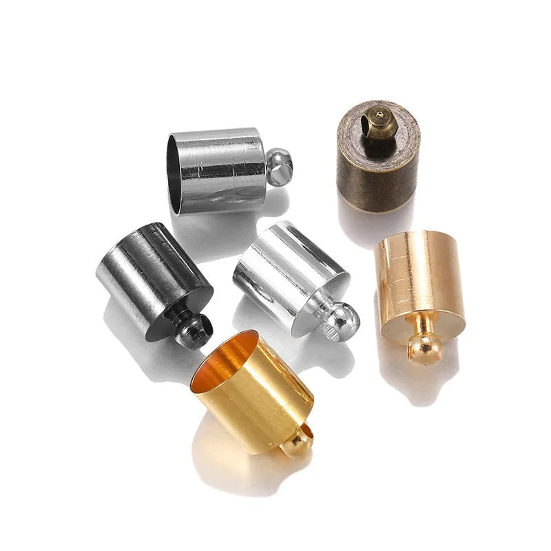 Assorted copper caps in gold, silver, black, and bronze finishes for jewellery making