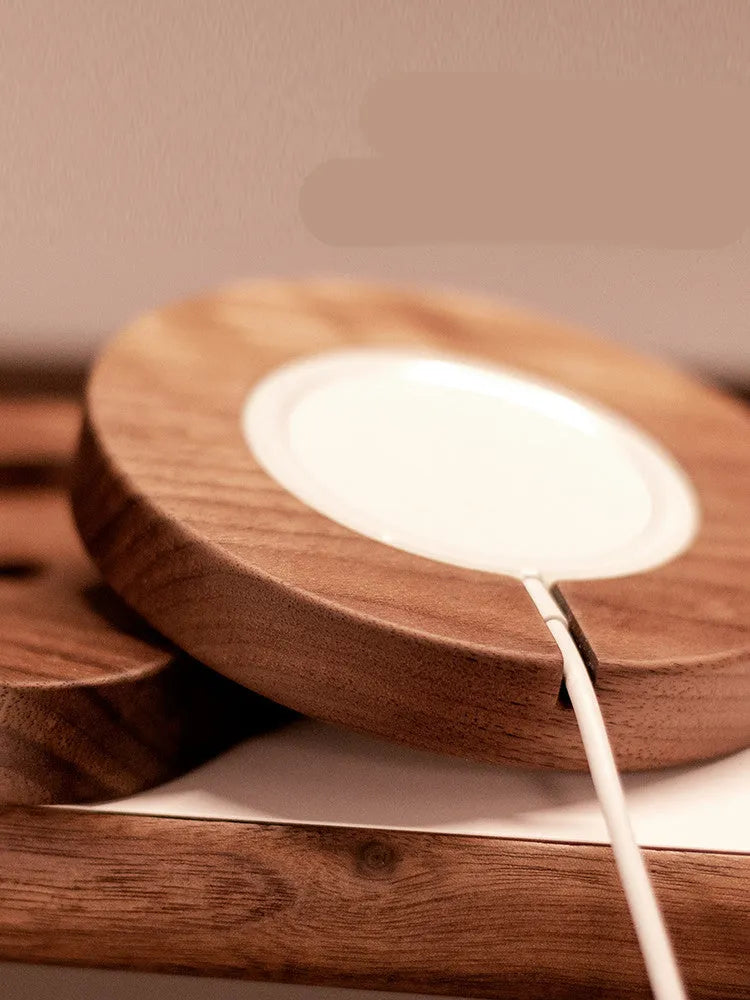 Walnut wood magnetic wireless charging bracket for iPhone MagSafe on desktop