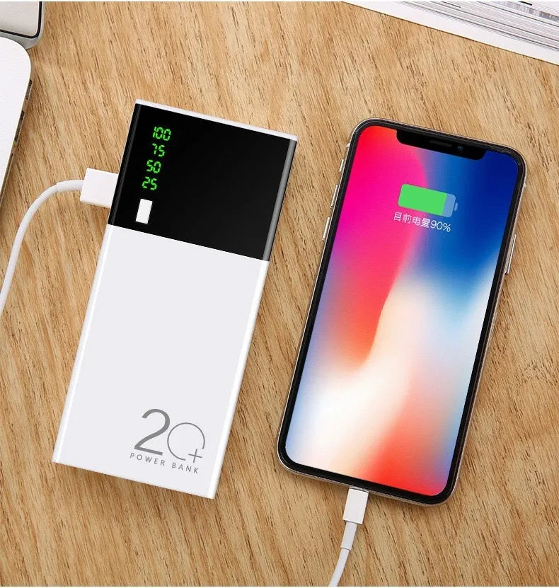 Black 20000mAh portable power bank with charging cable, dimensions 135mm by 60mm.