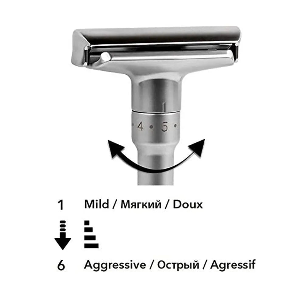 Manual old-fashioned razor with stainless steel blade and zinc alloy handle in black finish on a neutral background