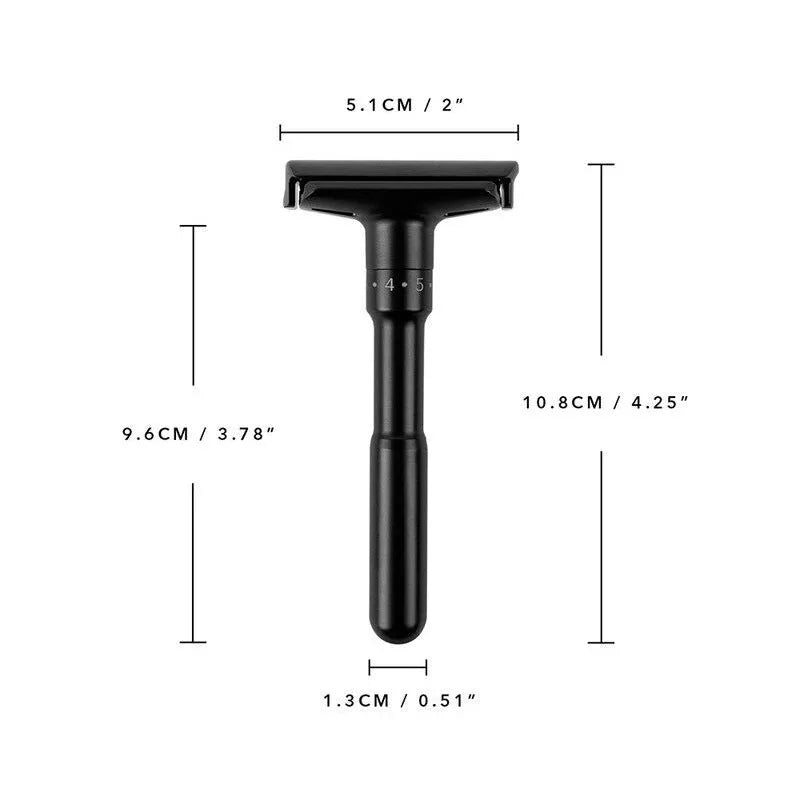 Manual old-fashioned razor with stainless steel blade and zinc alloy handle in black finish on a neutral background
